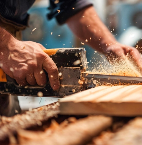 Wood cutting by carpenter